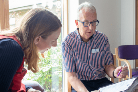 Views on Care survey taking place with volunteer and patient