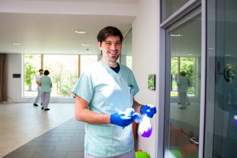 Man cleaning in the hospice