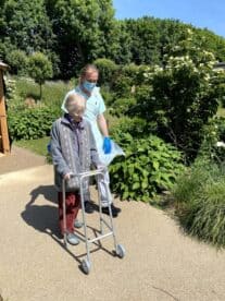 IMG 1270 Physio with patient in garden facing camera