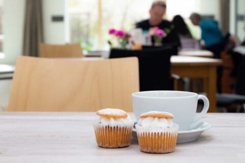 Cup of tea and two small cakes in the hospice cafe