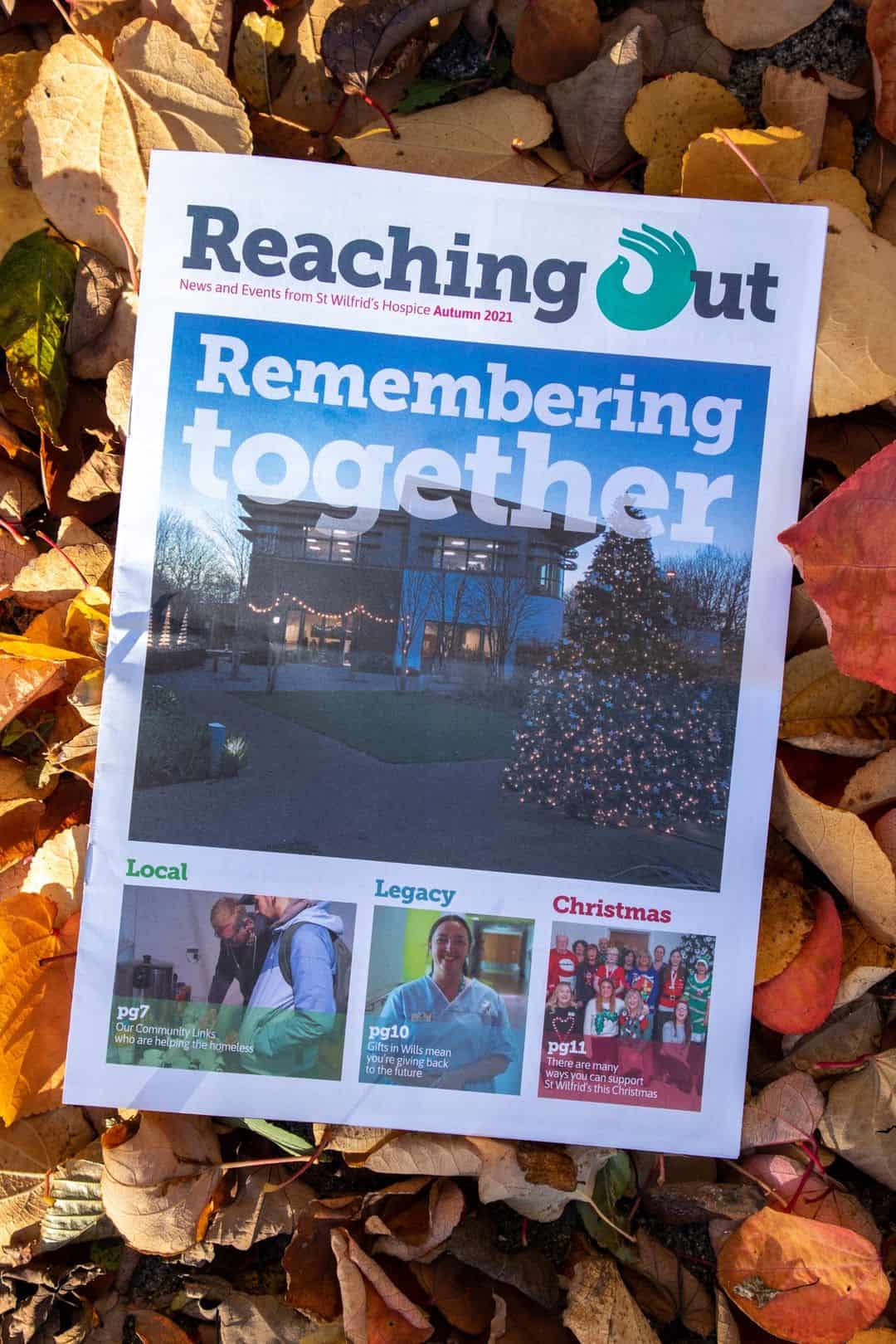ReachingOut On Leaves Copies of Reaching Out Magazine on leaf background