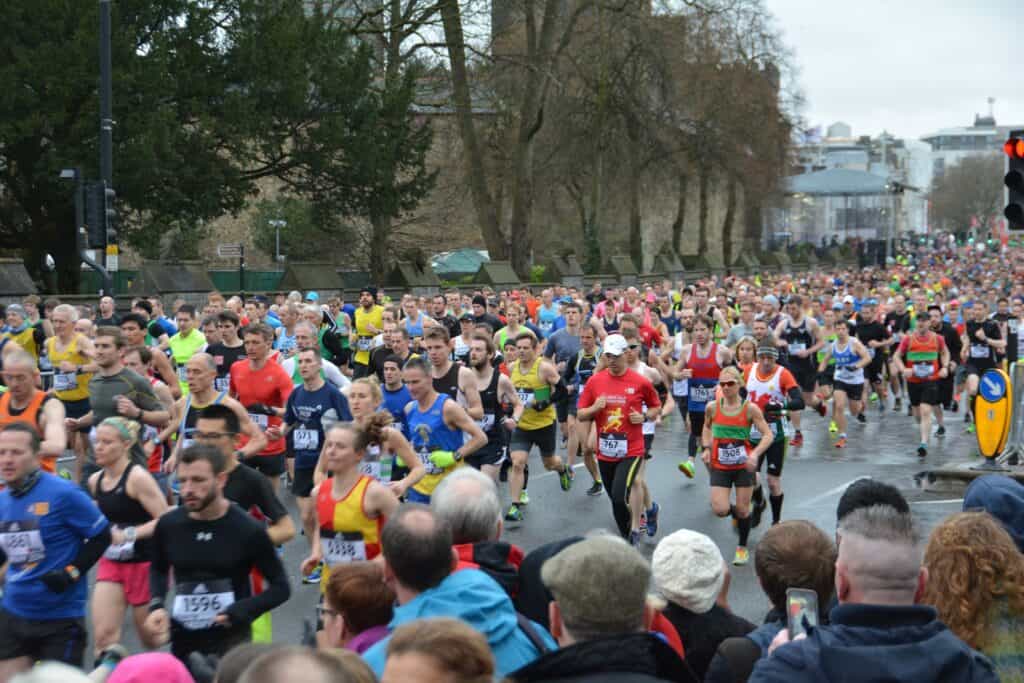 large group of runners in marathon