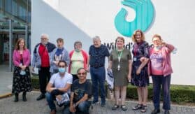 Sue Marsden and Lucy Cheshire with a group from Mencap Eastbourne outside the hospice