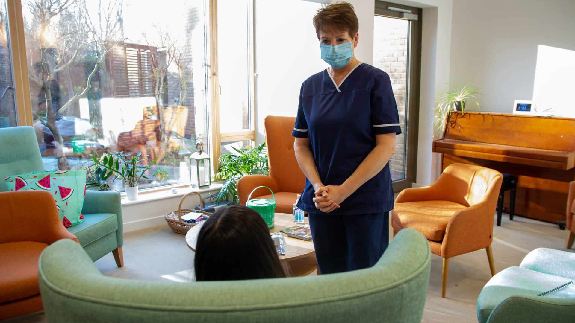 Nurse with patient in home