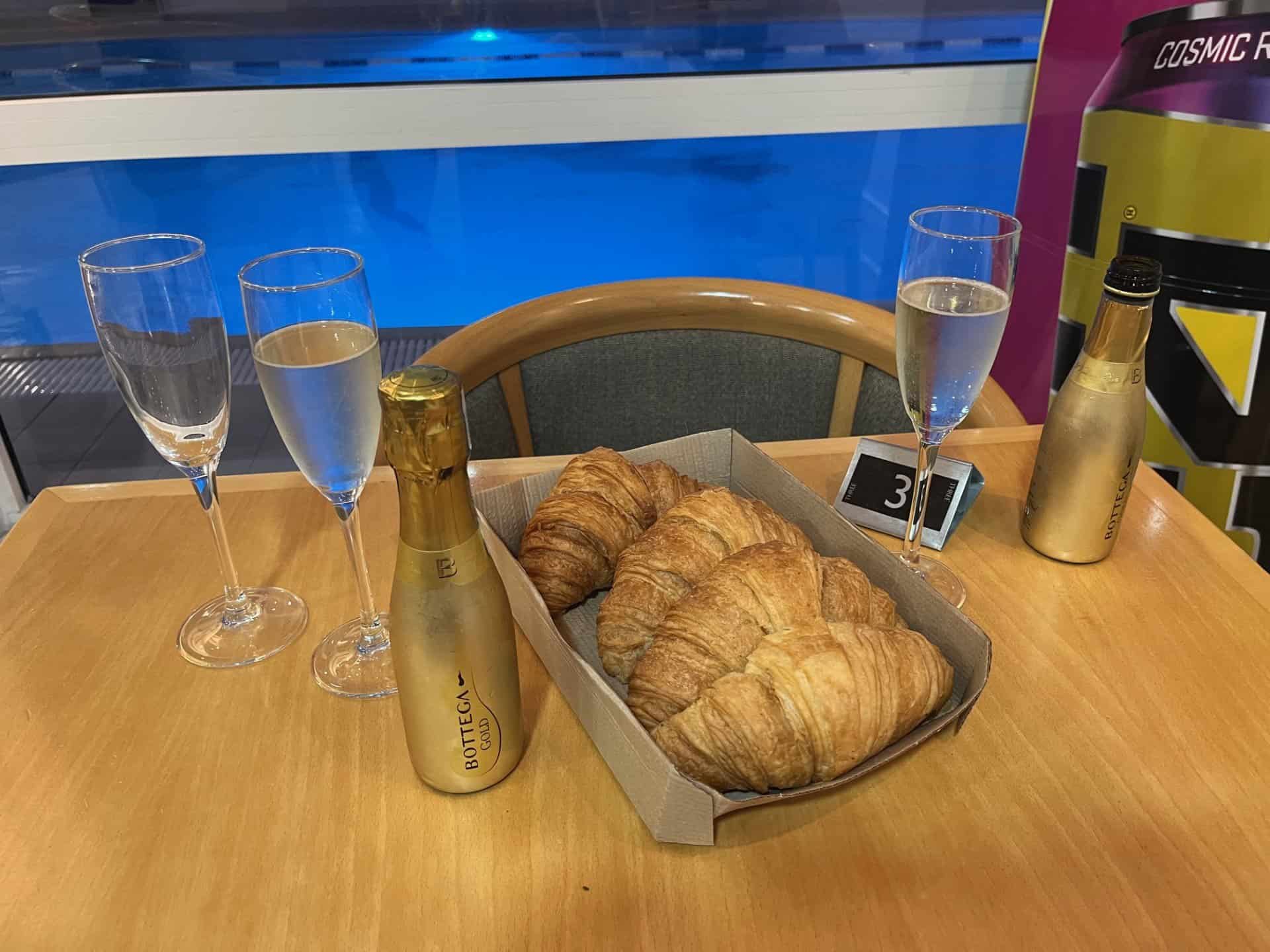 Croissants and prosecco by swimming pool