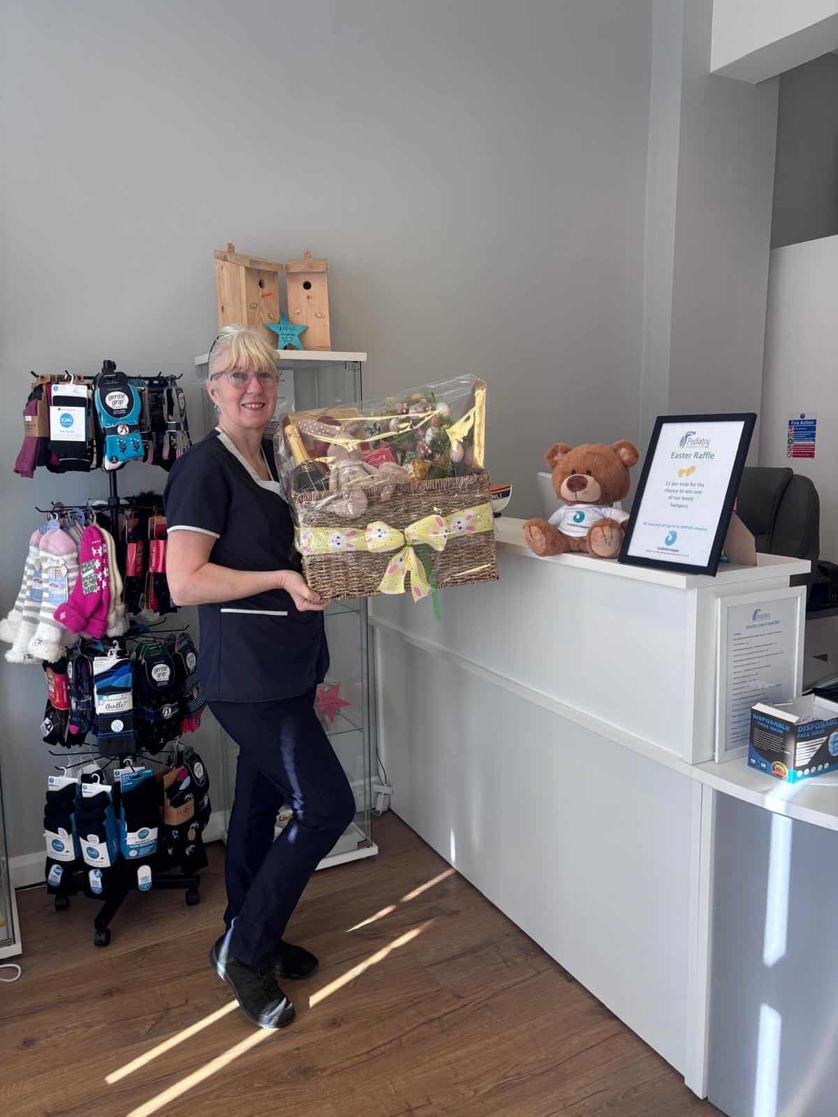 lady holding a raffle basket