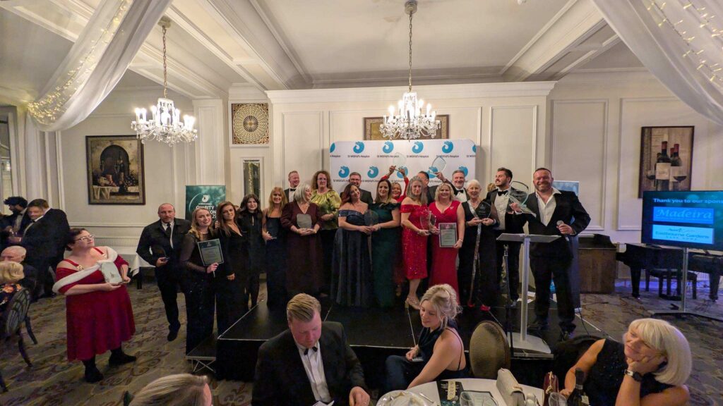 guests at award show with awards