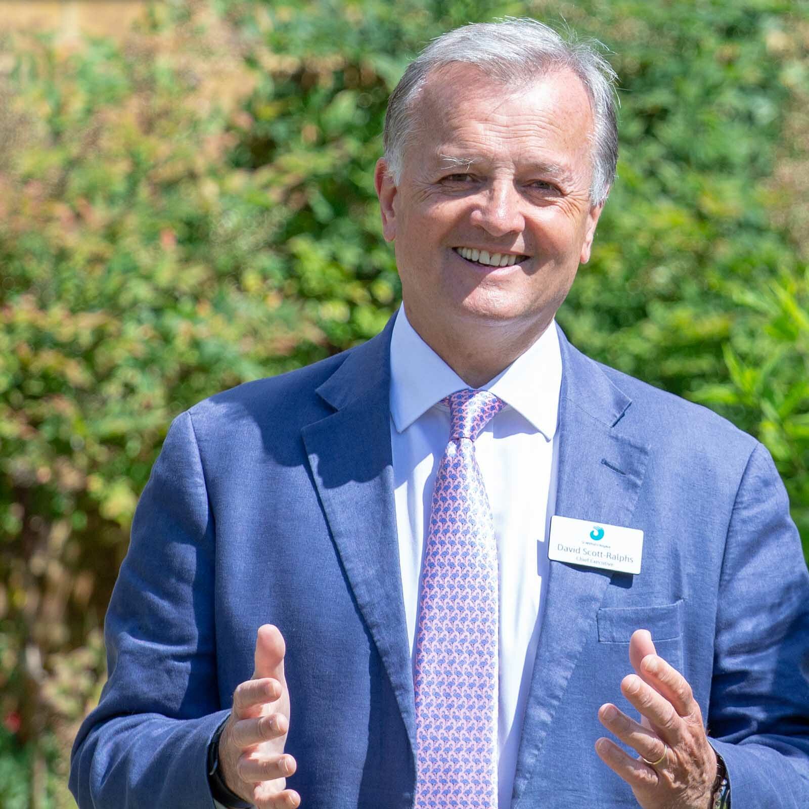 Lord Lieutenant Visit July 2019 David Scott-Ralphs smiling at camera with hands out