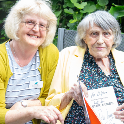 Volunteer and patient in garden
